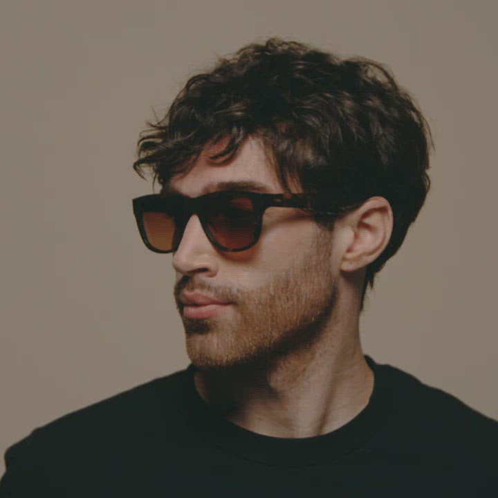 Load video: Tens Classic Tropic High / Matte Black Sunglasses Male Model Video