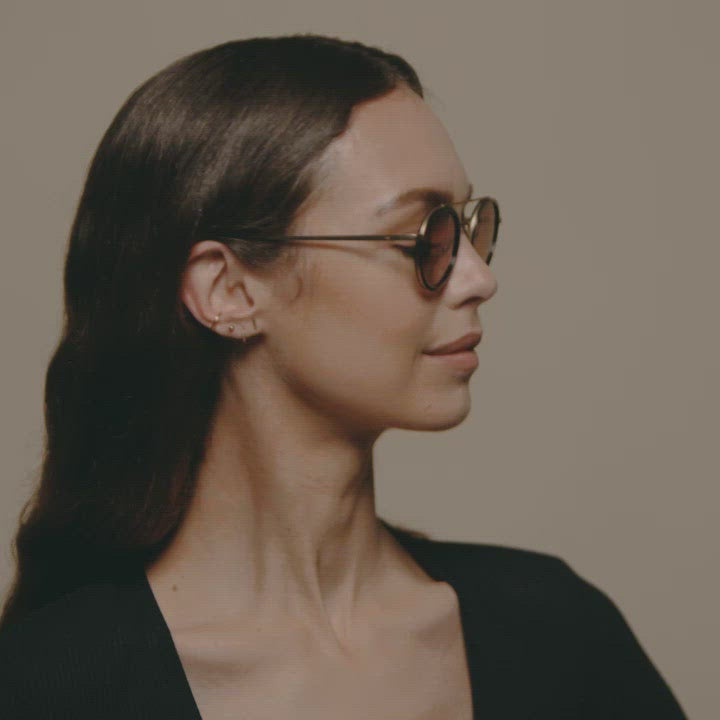 Load video: Tens Hoxton Original / Polished Black Gold Sunglasses Female Model Video