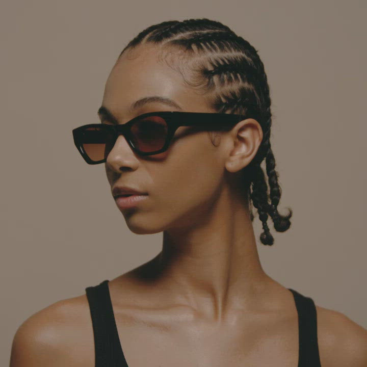 Load video: Tens Frankie Evergreen / Charcoal Sunglasses Female Model Video