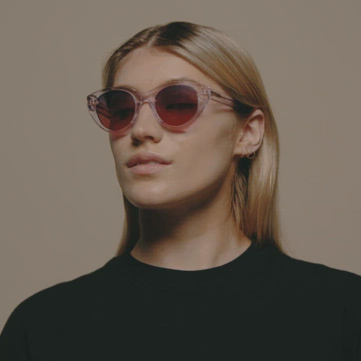 Load video: Tens Penny Tropic High / Mint Crystal Sunglasses Female Model Video