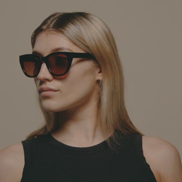 Load video: Tens Brooke Evergreen / Fern Sunglasses Female Model Video